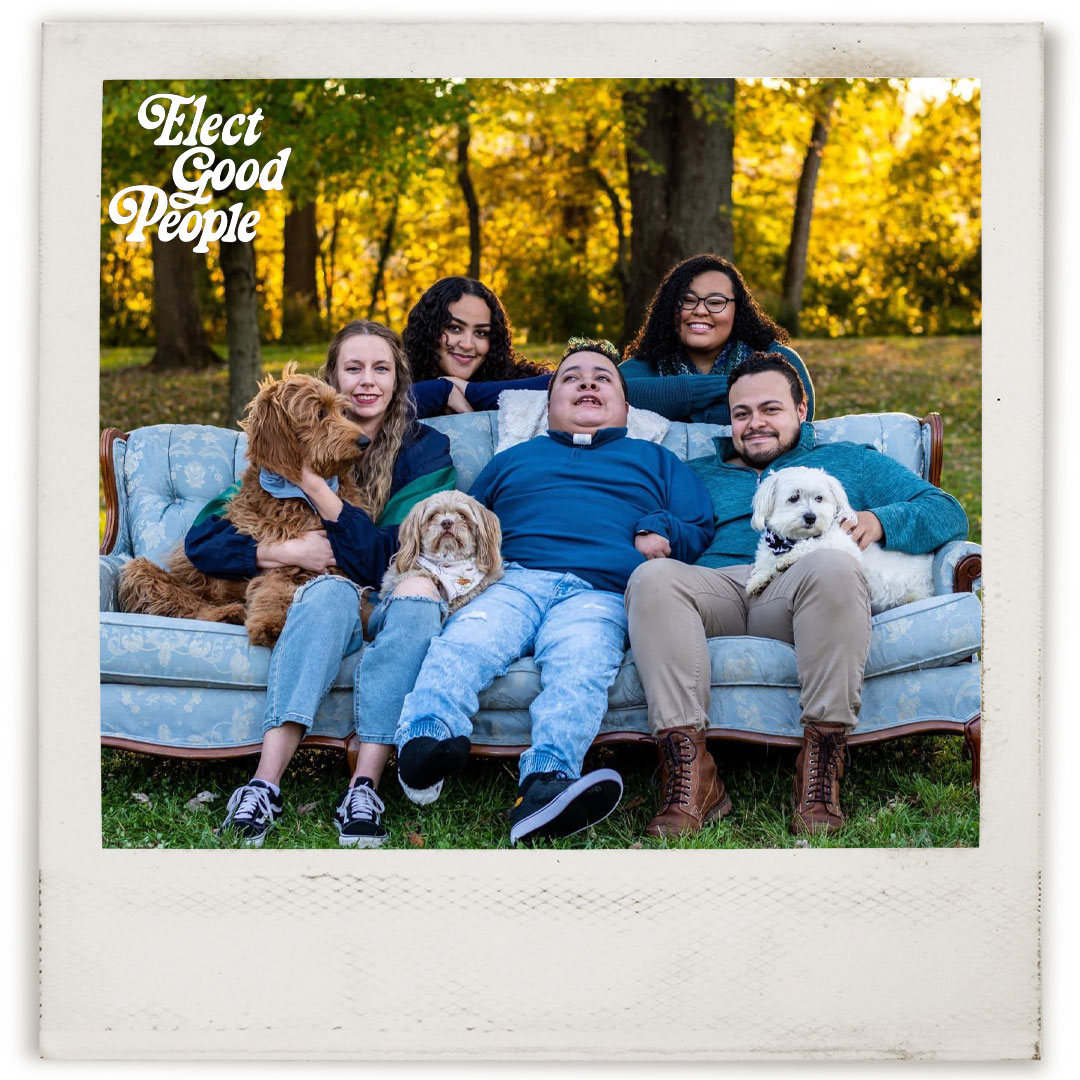 Candidate Nathaniel Alan Hawkins posing with family and pets in group portrait