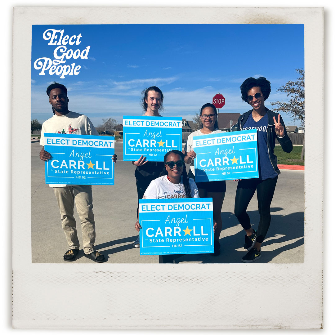 Candidate Angel Carroll with community members holding campaign signs that read "Elect Democrat Angel Carroll".