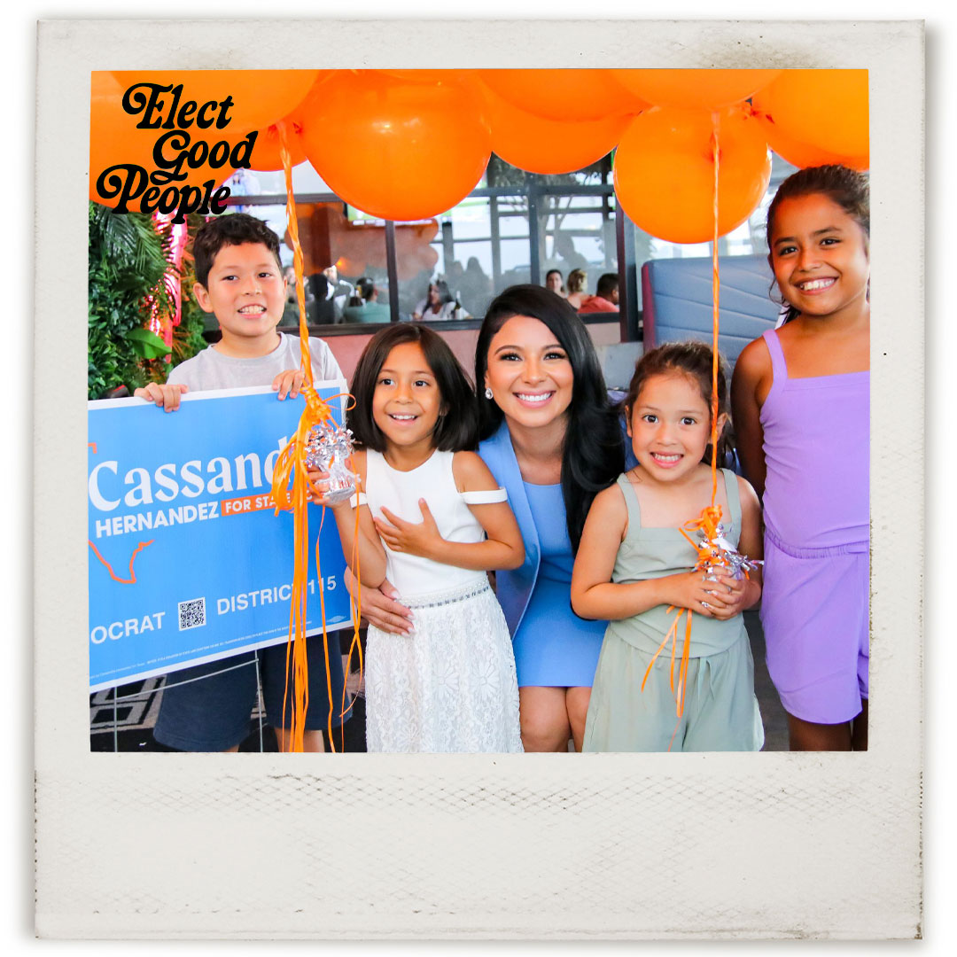 Candidate Cassandra Hernandez posing with children
